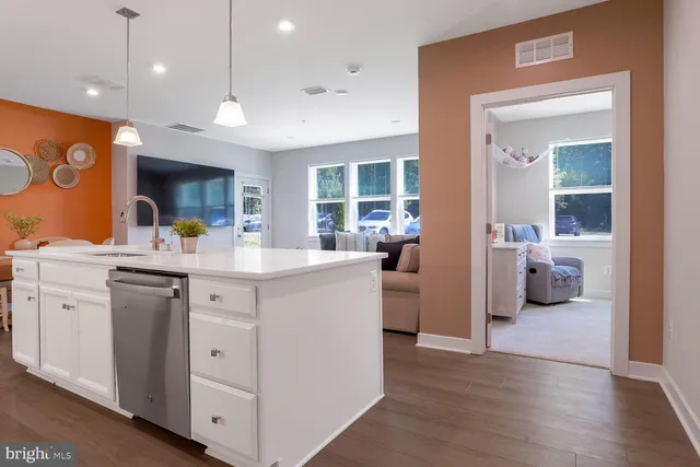 a view of living room with furniture and window
