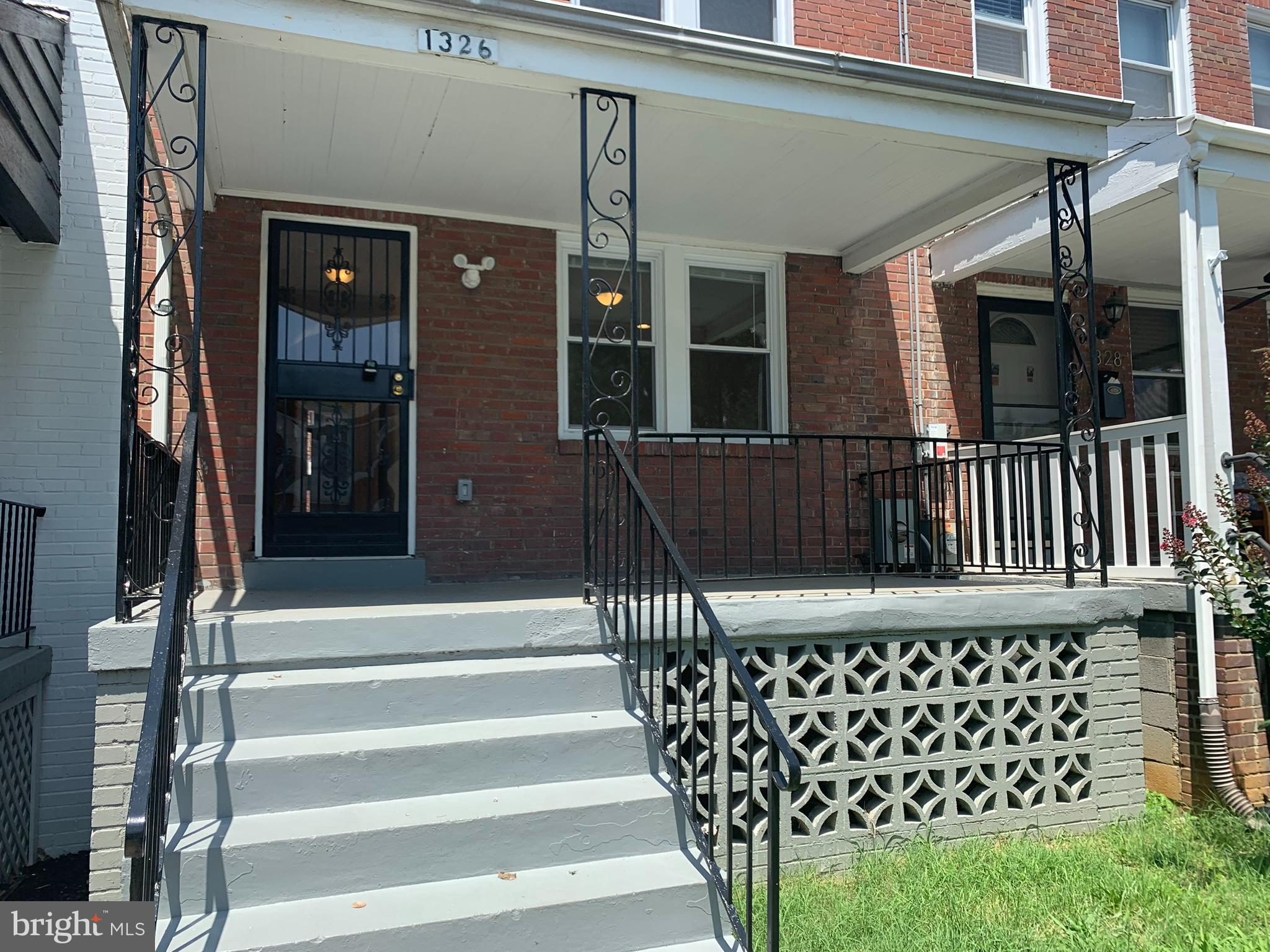 1326 Holbrook Street Northeast Washington, DC 20002 - Photo 2 of 21 a view of stairs and wooden deck