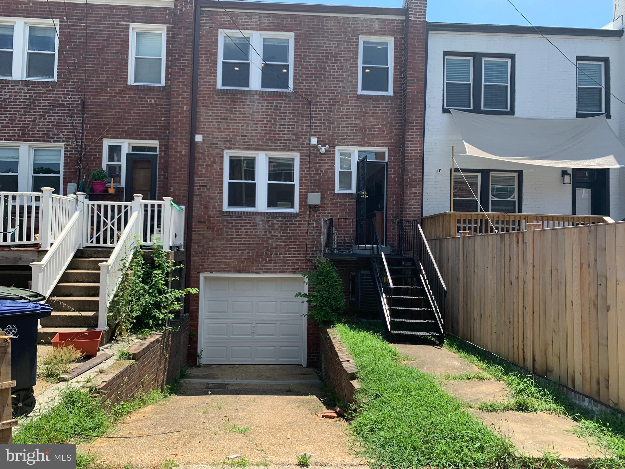 1326 Holbrook Street Northeast Washington, DC 20002 - Photo 21 of 21 a front view of a house with a yard