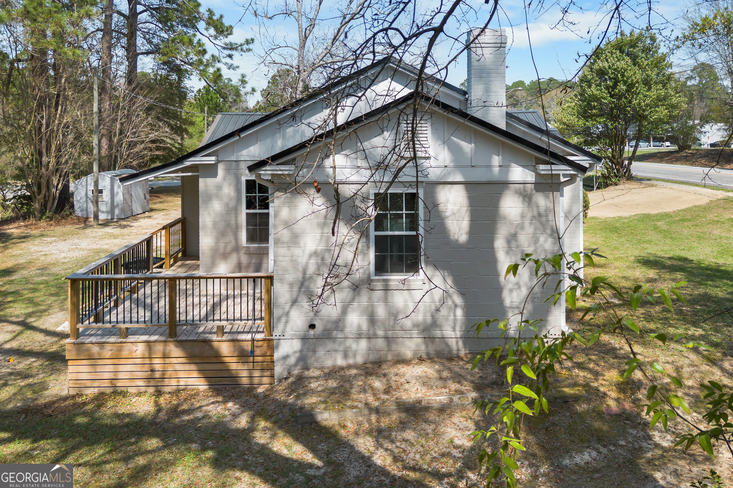 104 Halcyondale Road Sylvania, GA 30467 - Photo 18 of 33 a view of a house with a yard