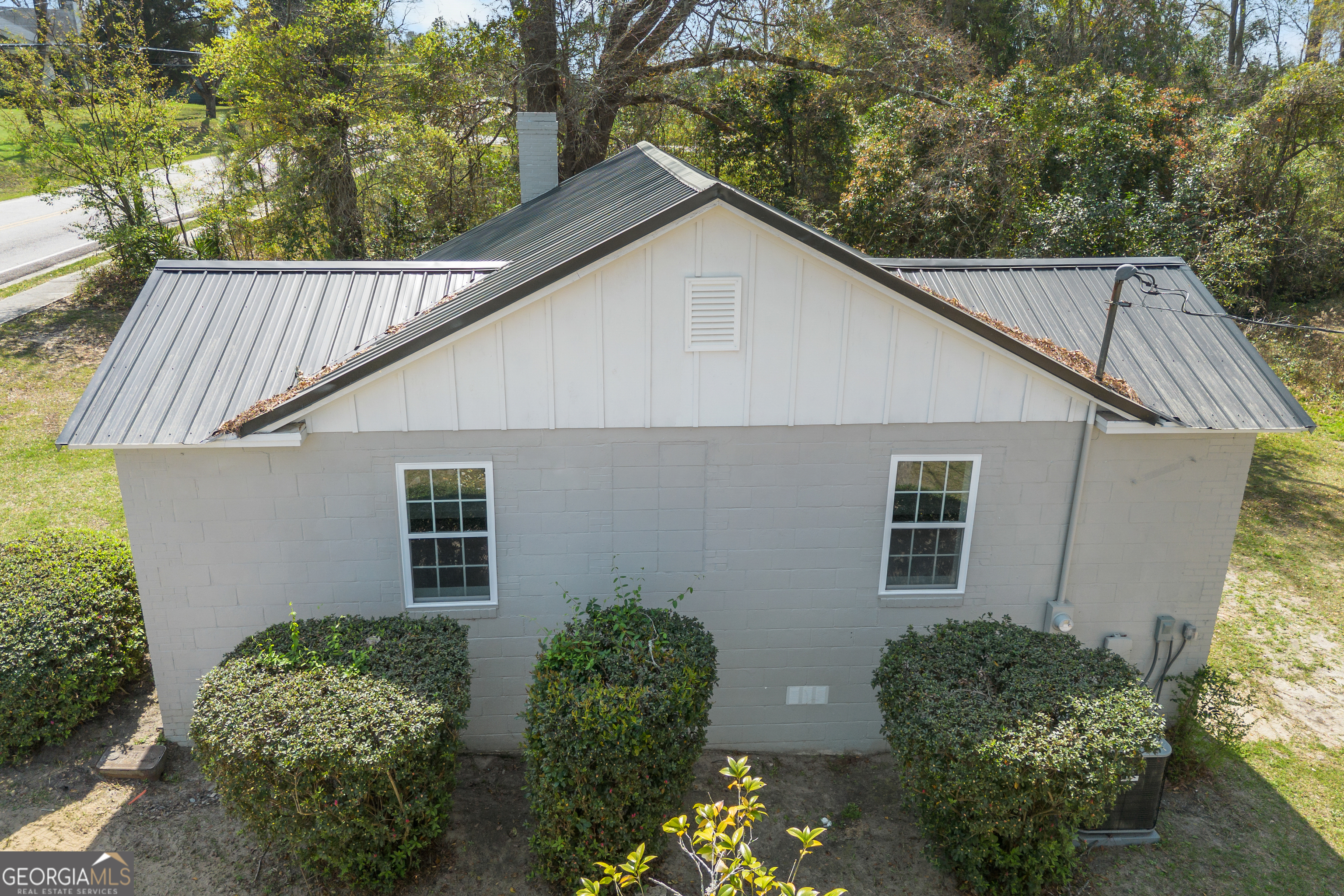 104 Halcyondale Road Sylvania, GA 30467 - Photo 20 of 33 a view of a house with a yard plants and large tree