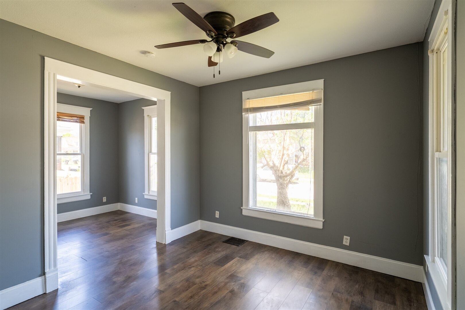 902 West Grove Street Bloomington, IL 61701 - Photo 14 of 17 a view of a livingroom with a ceiling fan and window