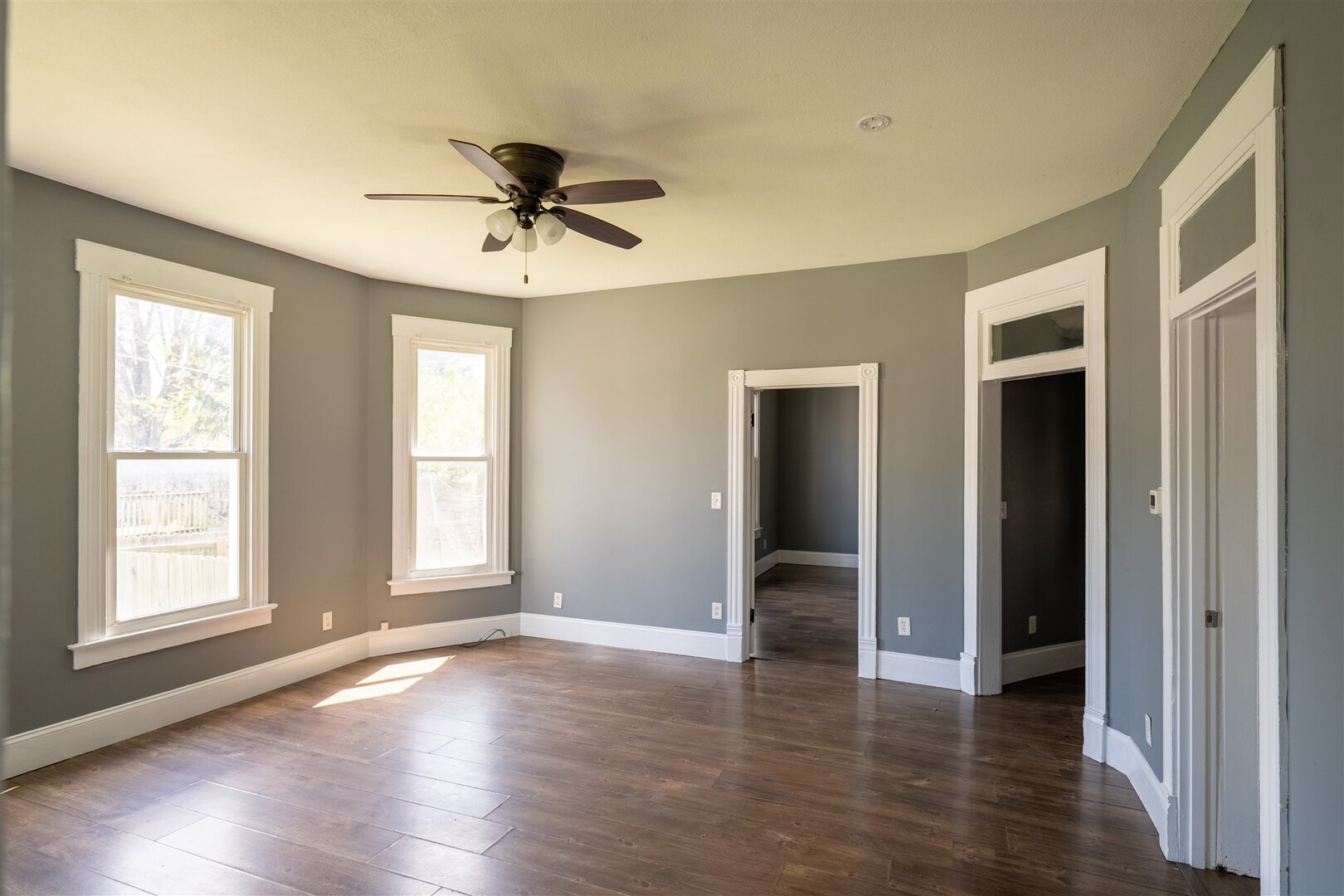 902 West Grove Street Bloomington, IL 61701 - Photo 16 of 17 a view of an empty room with wooden floor and a window