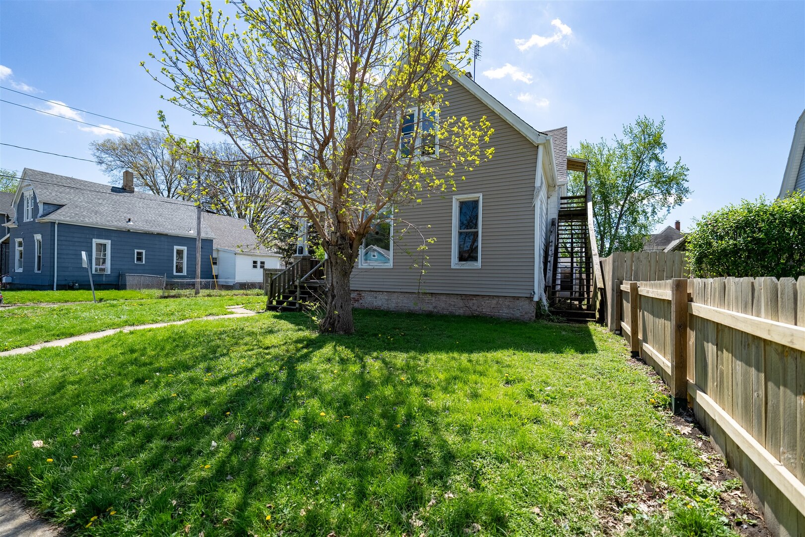 902 West Grove Street Bloomington, IL 61701 - Photo 3 of 17 a view of house with backyard