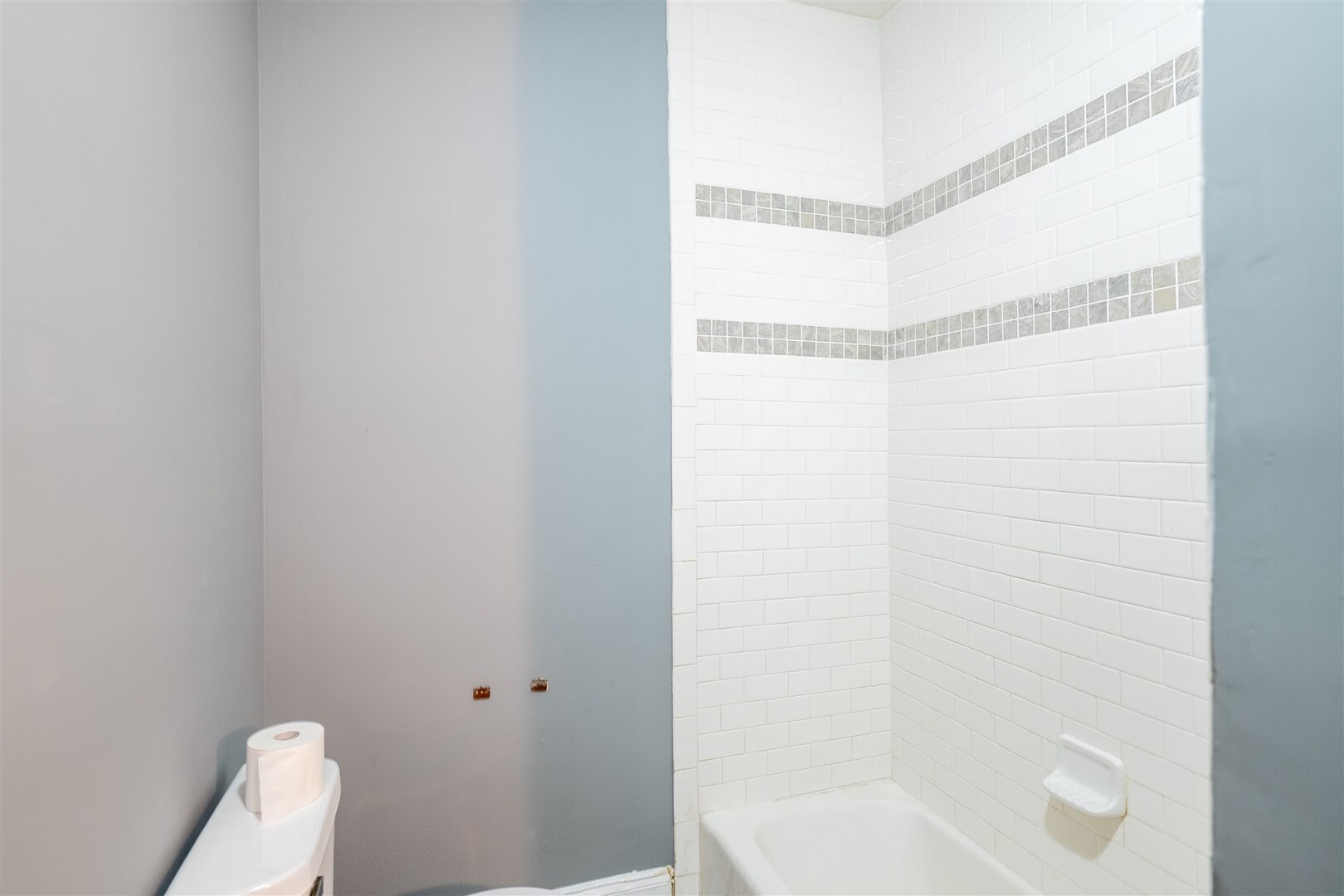 902 West Grove Street Bloomington, IL 61701 - Photo 9 of 17 a bathroom with a shower and a toilet