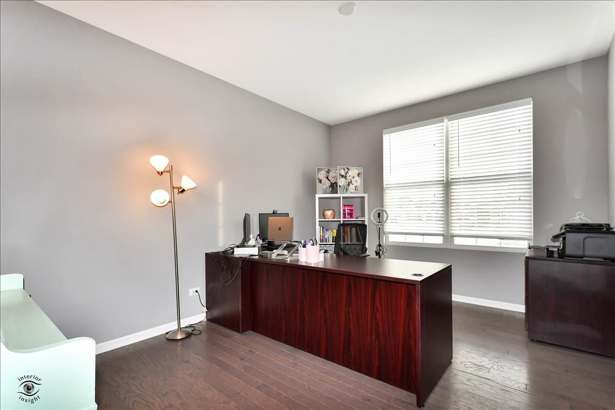 1500 Pine Drive Woodridge, IL 60517 - Photo 14 of 30 a kitchen with granite countertop a sink cabinets and window