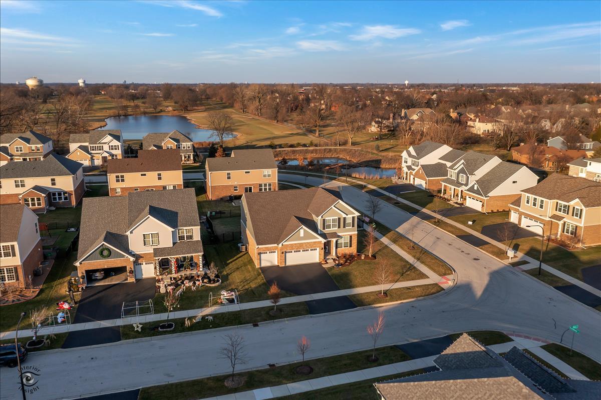 1500 Pine Drive Woodridge, IL 60517 - Photo 3 of 30 an aerial view of residential houses with outdoor space