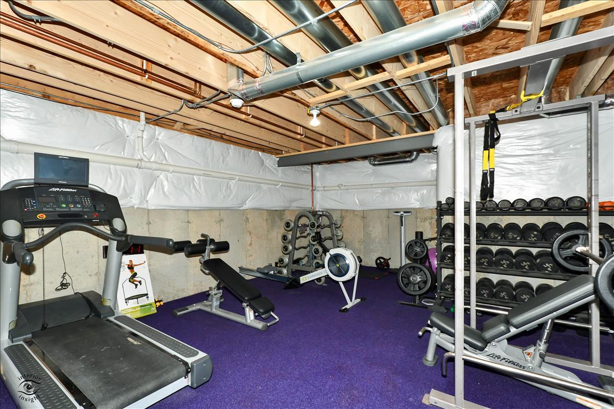 1500 Pine Drive Woodridge, IL 60517 - Photo 26 of 30 a view of a room with gym equipment