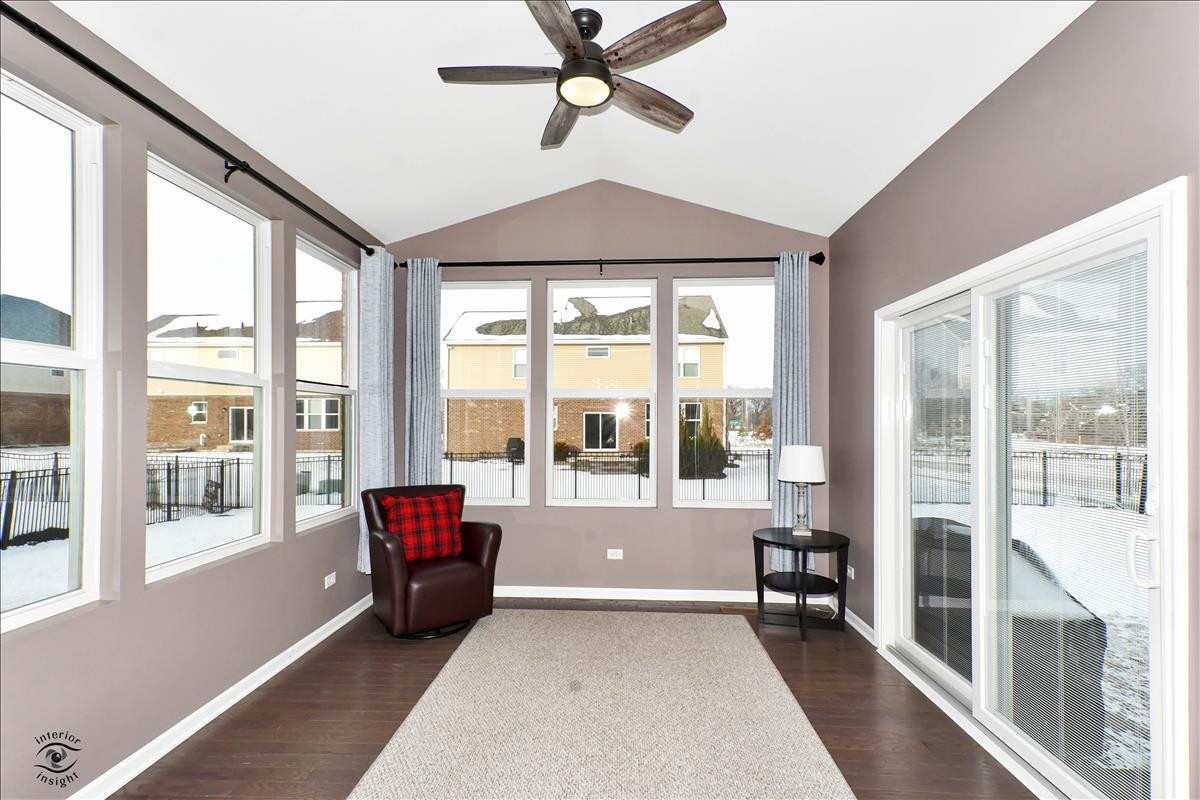 1500 Pine Drive Woodridge, IL 60517 - Photo 10 of 30 a living room filled with furniture and a large window