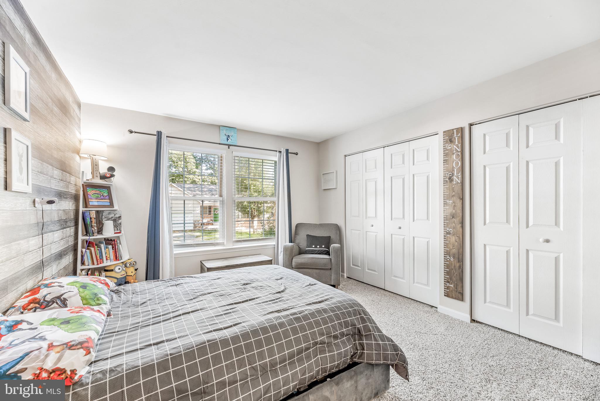 11156 Rawhide Road Lusby, MD 20657 - Photo 19 of 33 a bedroom with a bed and a window