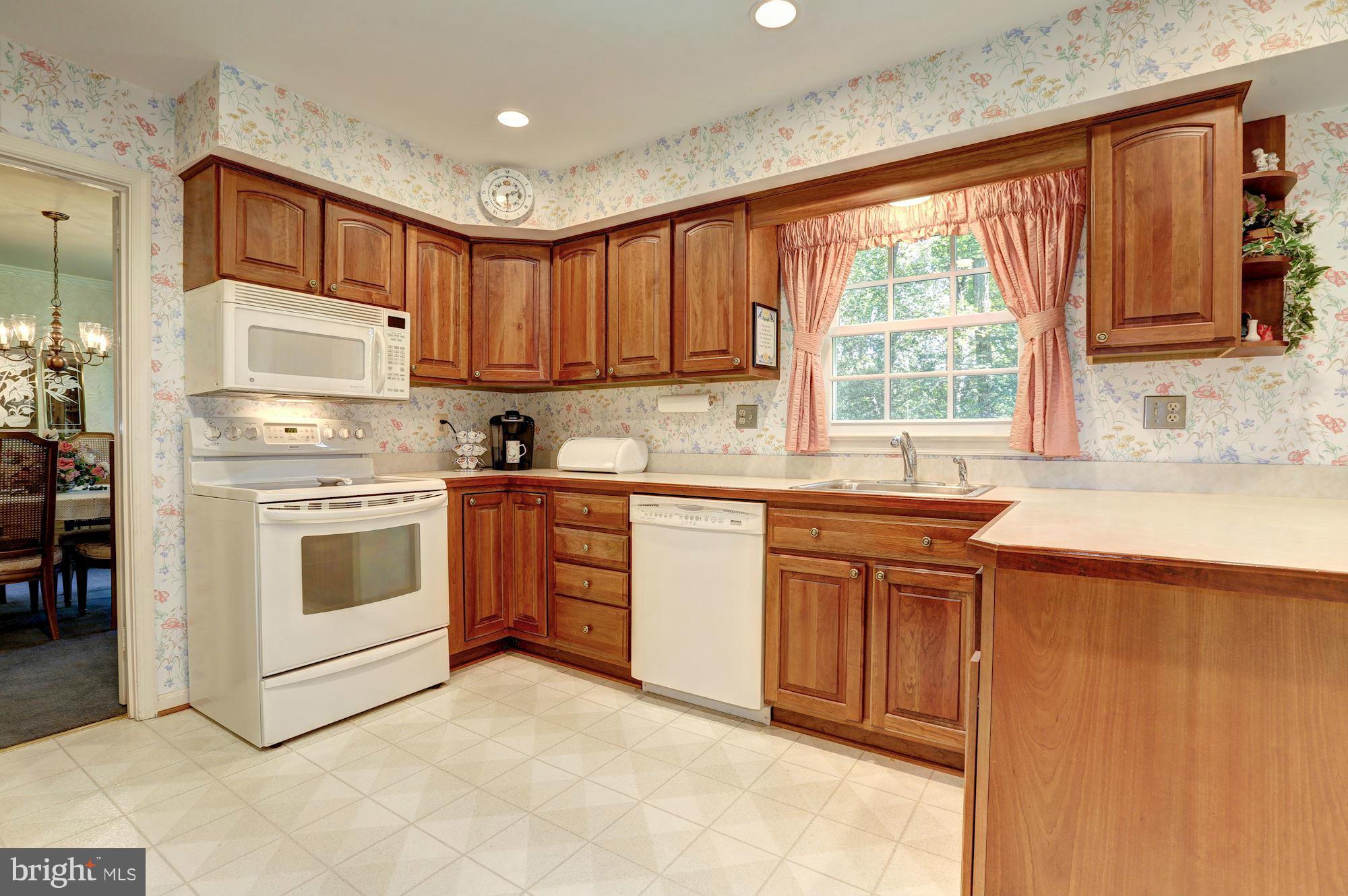 11303 Fieldstone Lane Reston, VA 20191 - Photo 9 of 30 Kitchen boasts beautiful Cherry Cabinets