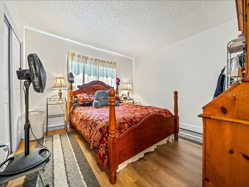 543 Silver Course Court Ocala, FL 34472 - Photo 11 of 21 a bed sitting in a bedroom next to a window