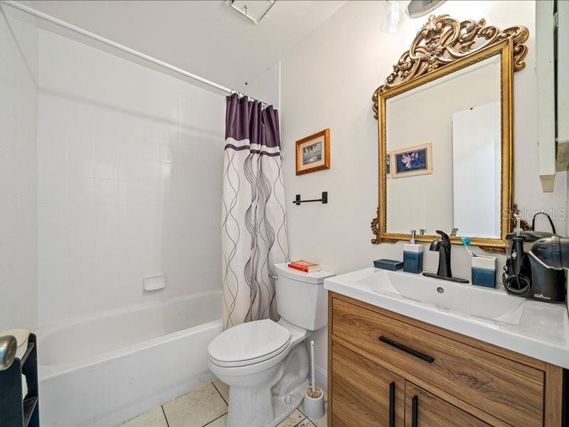 543 Silver Course Court Ocala, FL 34472 - Photo 13 of 21 a bathroom with a sink toilet and shower