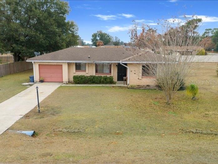 543 Silver Course Court Ocala, FL 34472 - Photo 17 of 21 a view of a house with a patio