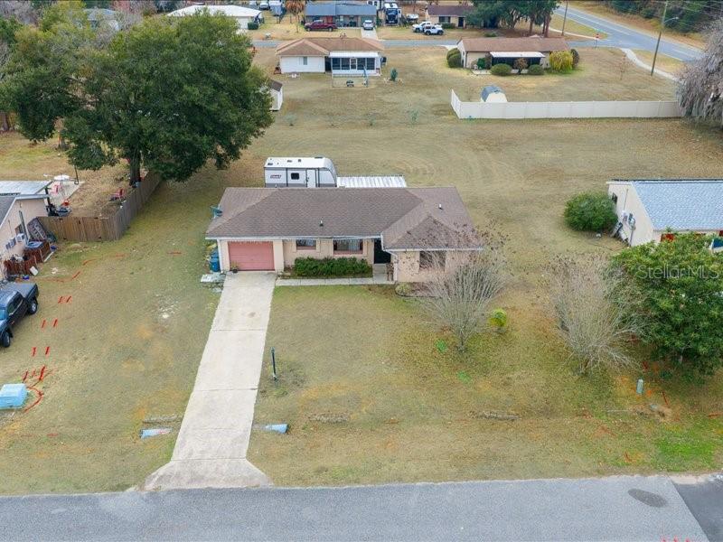 543 Silver Course Court Ocala, FL 34472 - Photo 18 of 21 an aerial view of a house with swimming pool