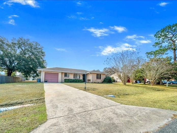 543 Silver Course Court Ocala, FL 34472 - Photo 2 of 21 a view of an outdoor space and yard