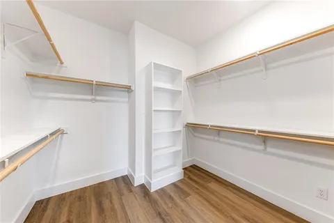 a view of an empty walk in closet