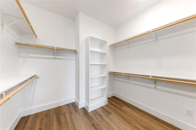 a view of an empty walk in closet