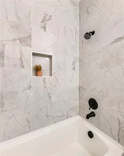 a bathroom with a bathtub