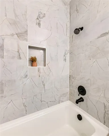 a bathroom with a bathtub