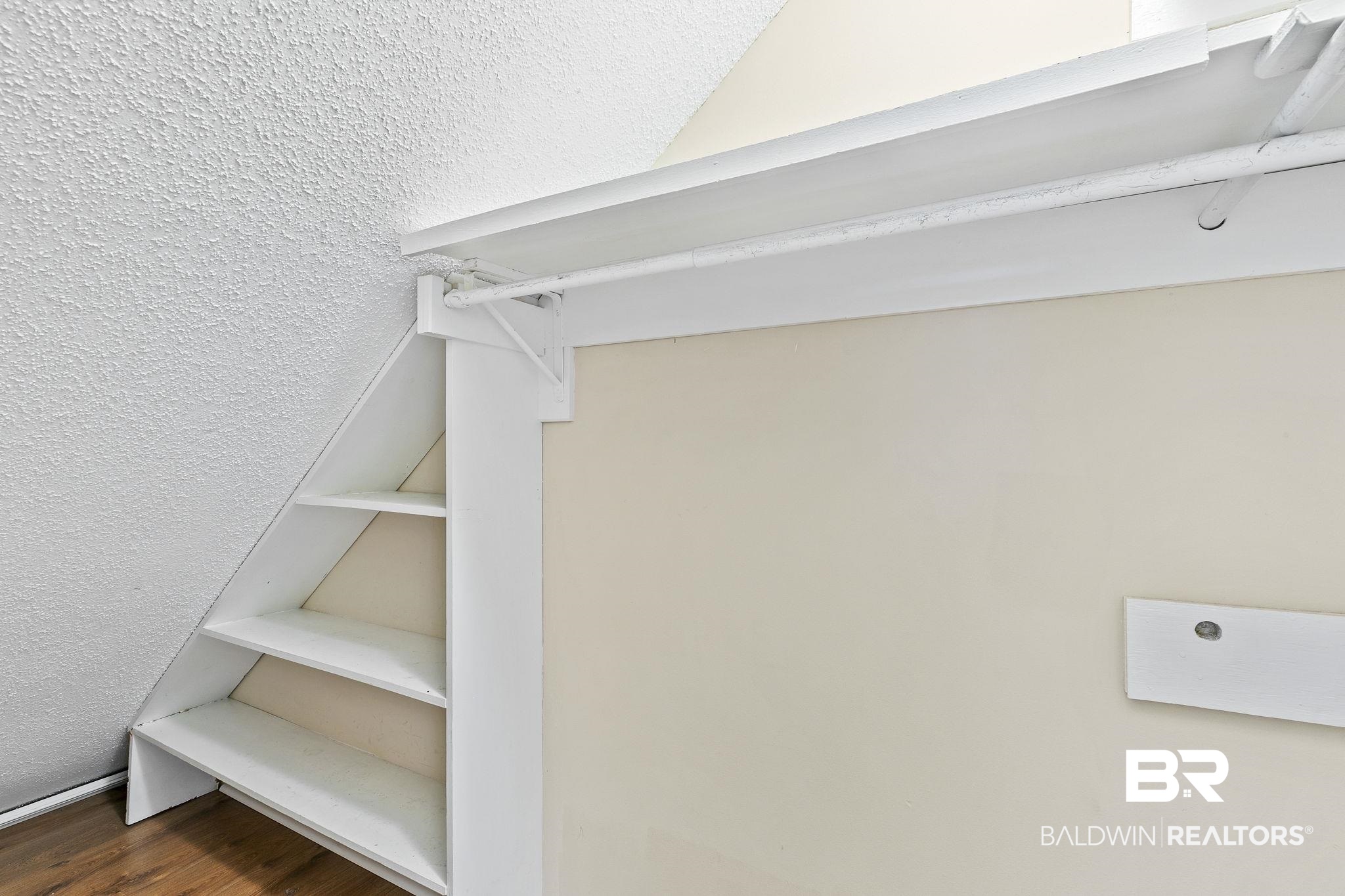 359 Ridgewood Drive Daphne, AL 36526 - Photo 27 of 73 Spacious closet with dark wood-type flooring