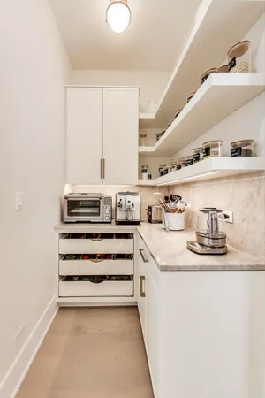 a kitchen with a sink and a stove