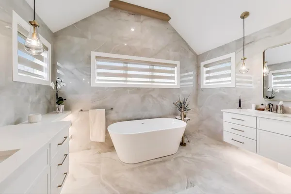 a bathroom with a bathtub sink and toilet