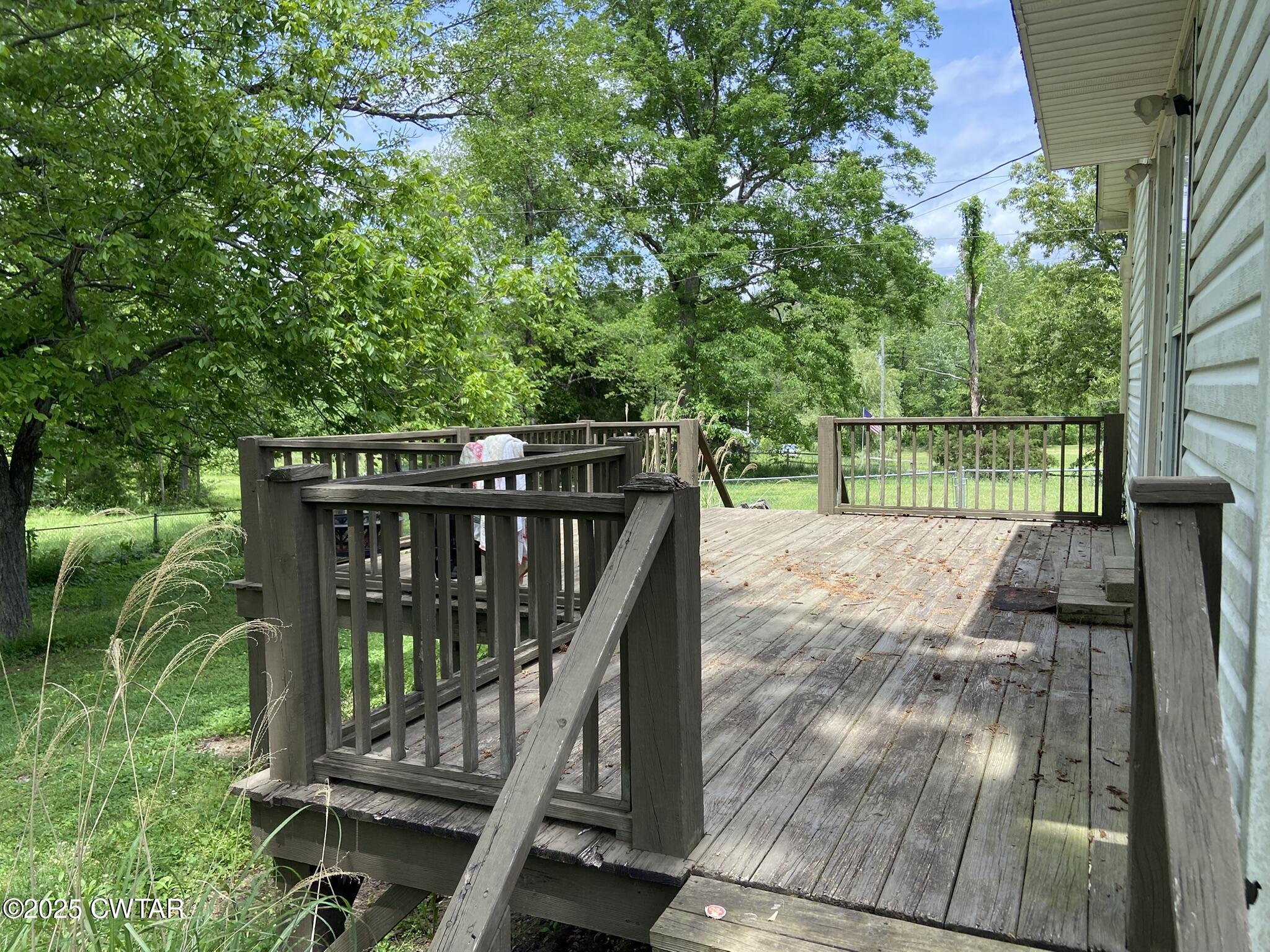 1100 Stewart Road Finger, TN 38334 - Photo 21 of 23 a view of balcony with deck and outdoor space