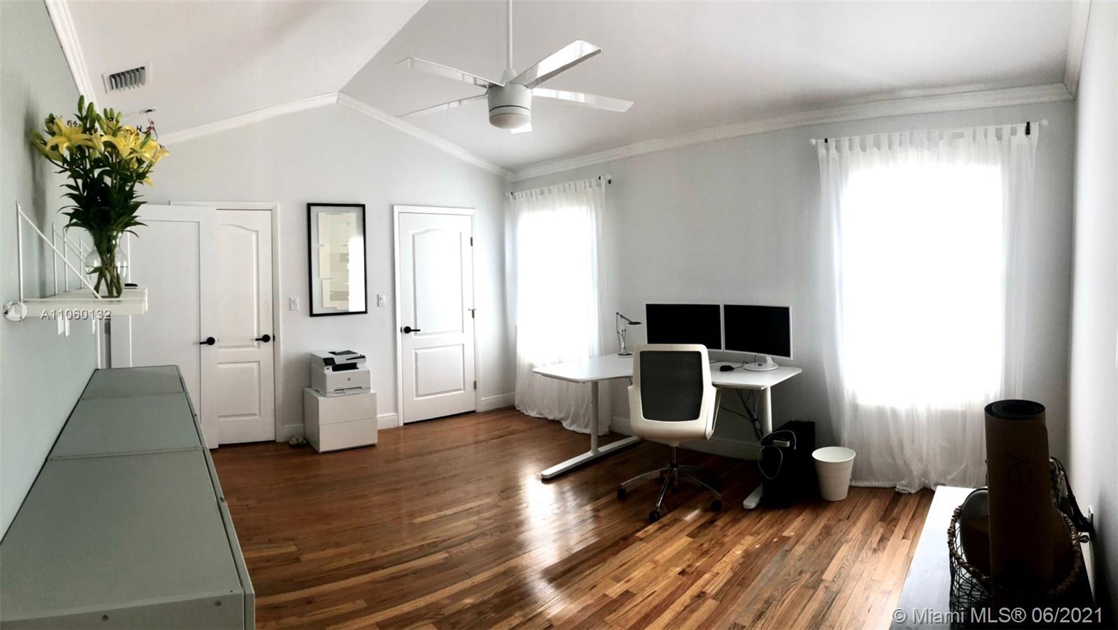 32 Southwest 23rd Road Miami, FL 33129 - Photo 19 of 27 a living room with furniture and a wooden floor