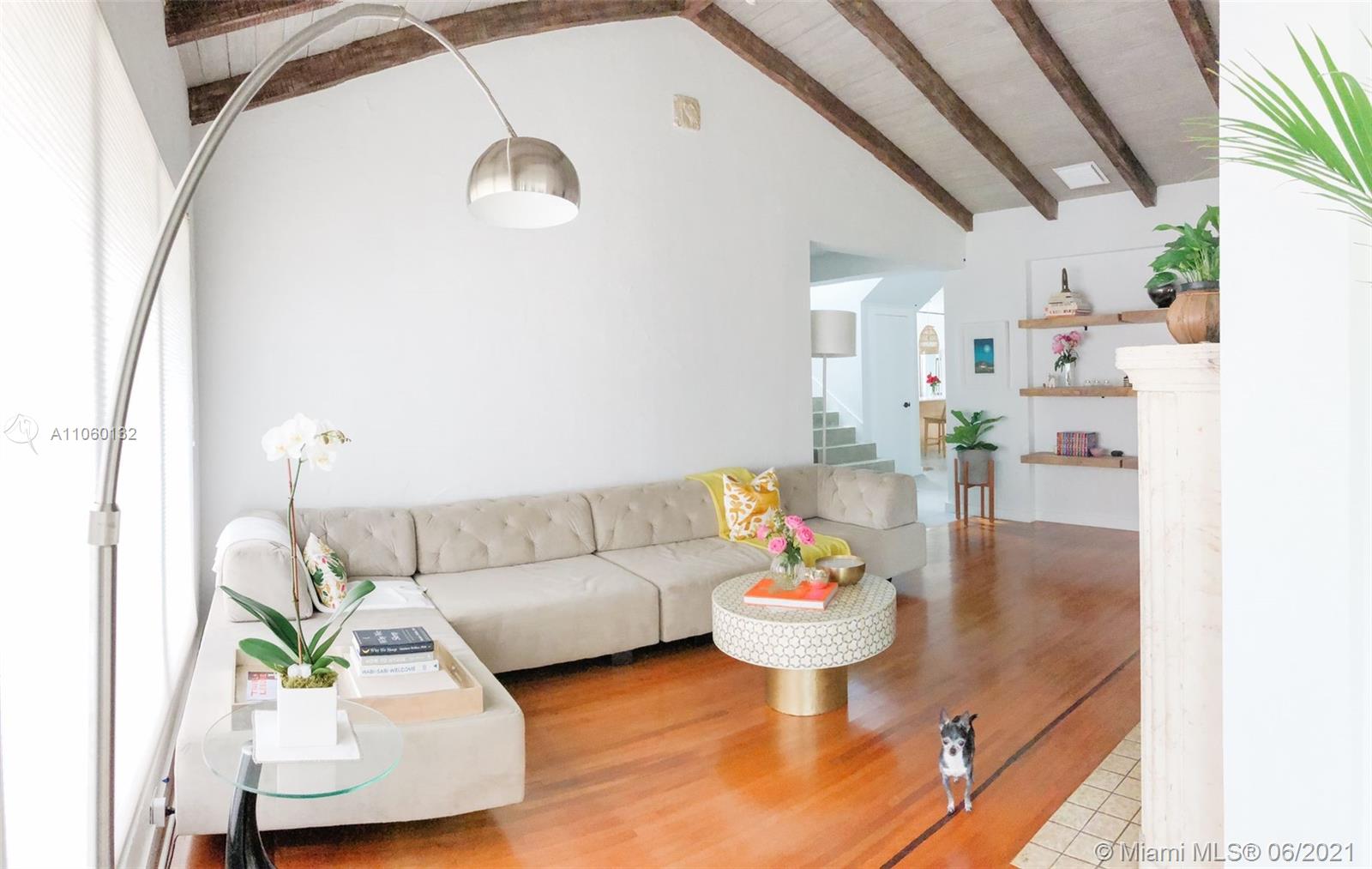 32 Southwest 23rd Road Miami, FL 33129 - Photo 4 of 27 a living room with furniture and a rug