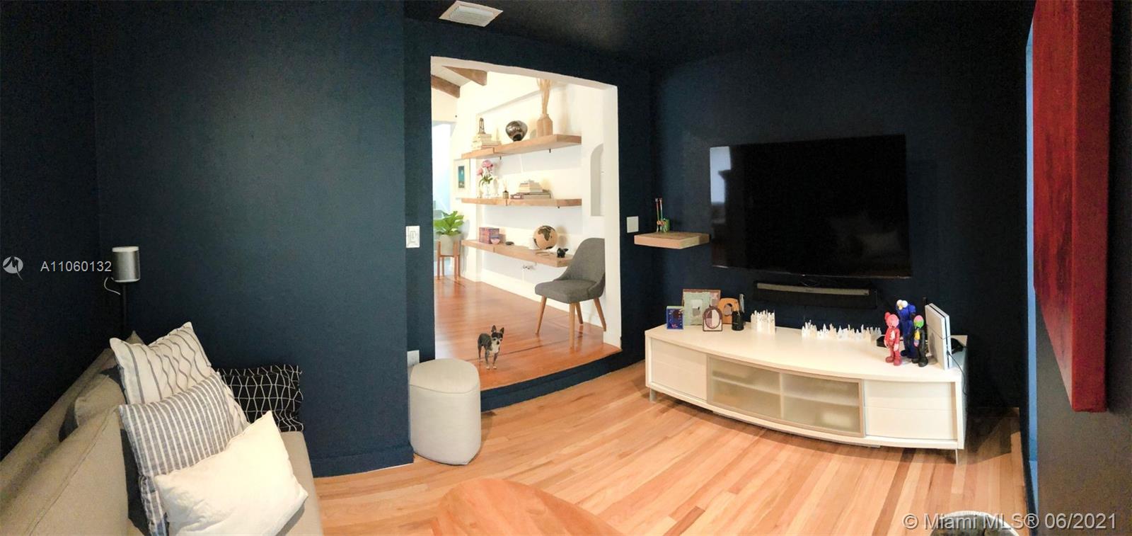 32 Southwest 23rd Road Miami, FL 33129 - Photo 8 of 27 a bathroom with a sink toilet and mirror