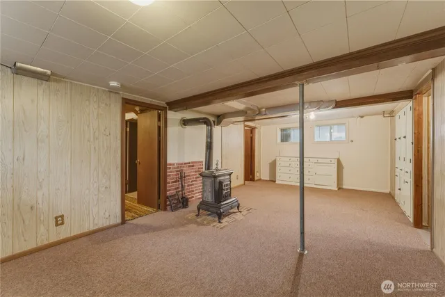 a view of fireplace with a mirror