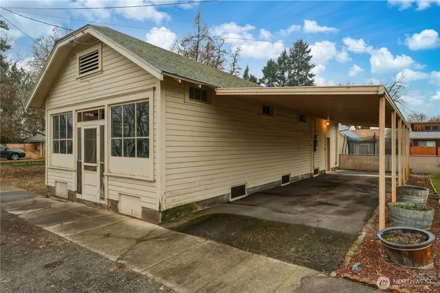 a backyard of a house with lots of green space