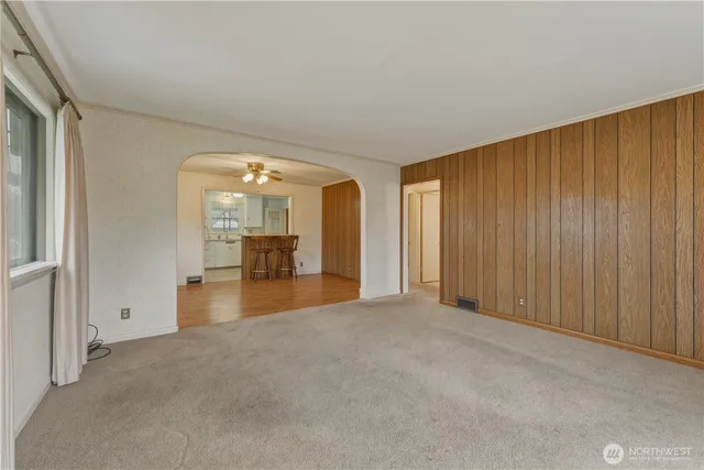 a view of kitchen with furniture and window