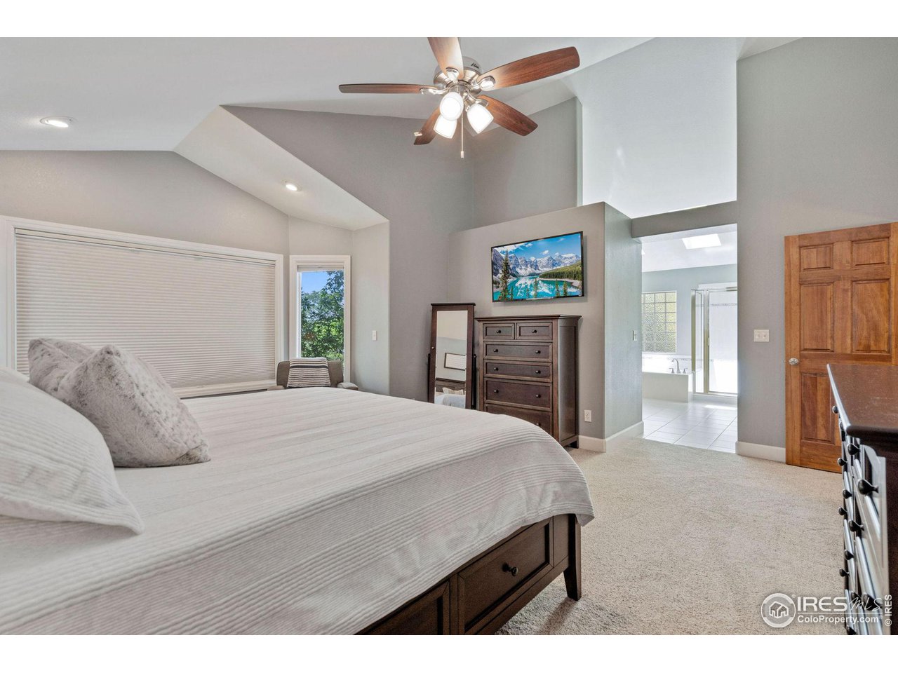 3761 Kentford Road Fort Collins, CO 80525 - Photo 23 of 40 Vaulted ceilings & an abundance of light