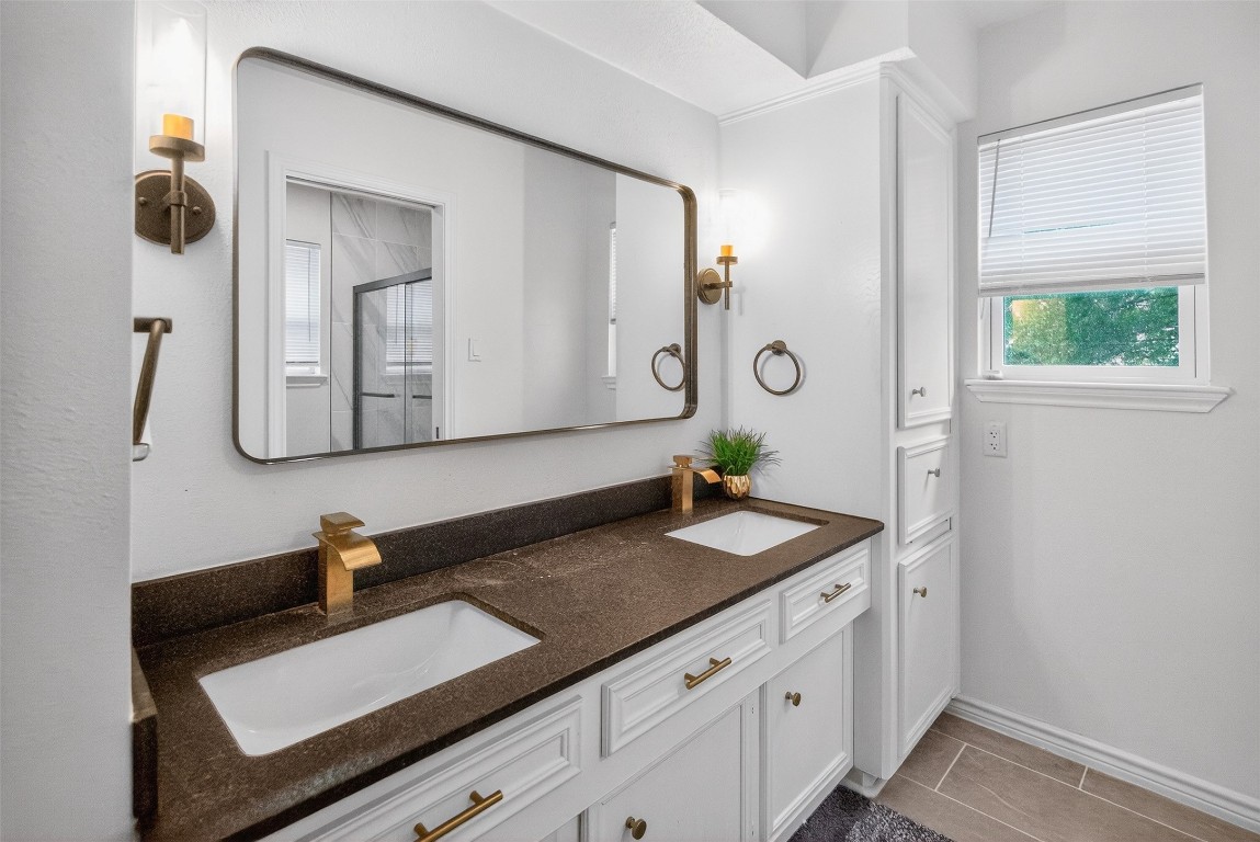 511 Enchanted Lane Spring, TX 77388 - Photo 34 of 38 a bathroom with a granite countertop sink and a mirror
