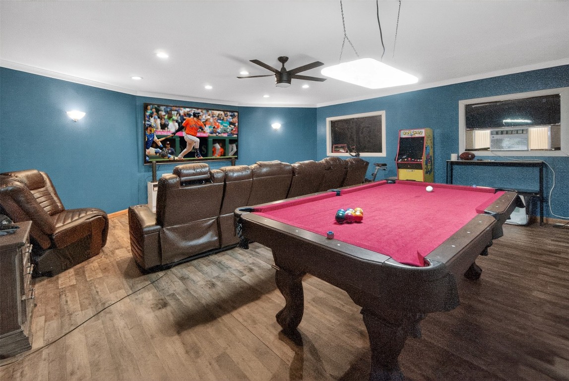 511 Enchanted Lane Spring, TX 77388 - Photo 36 of 38 a room with furniture and a flat screen tv