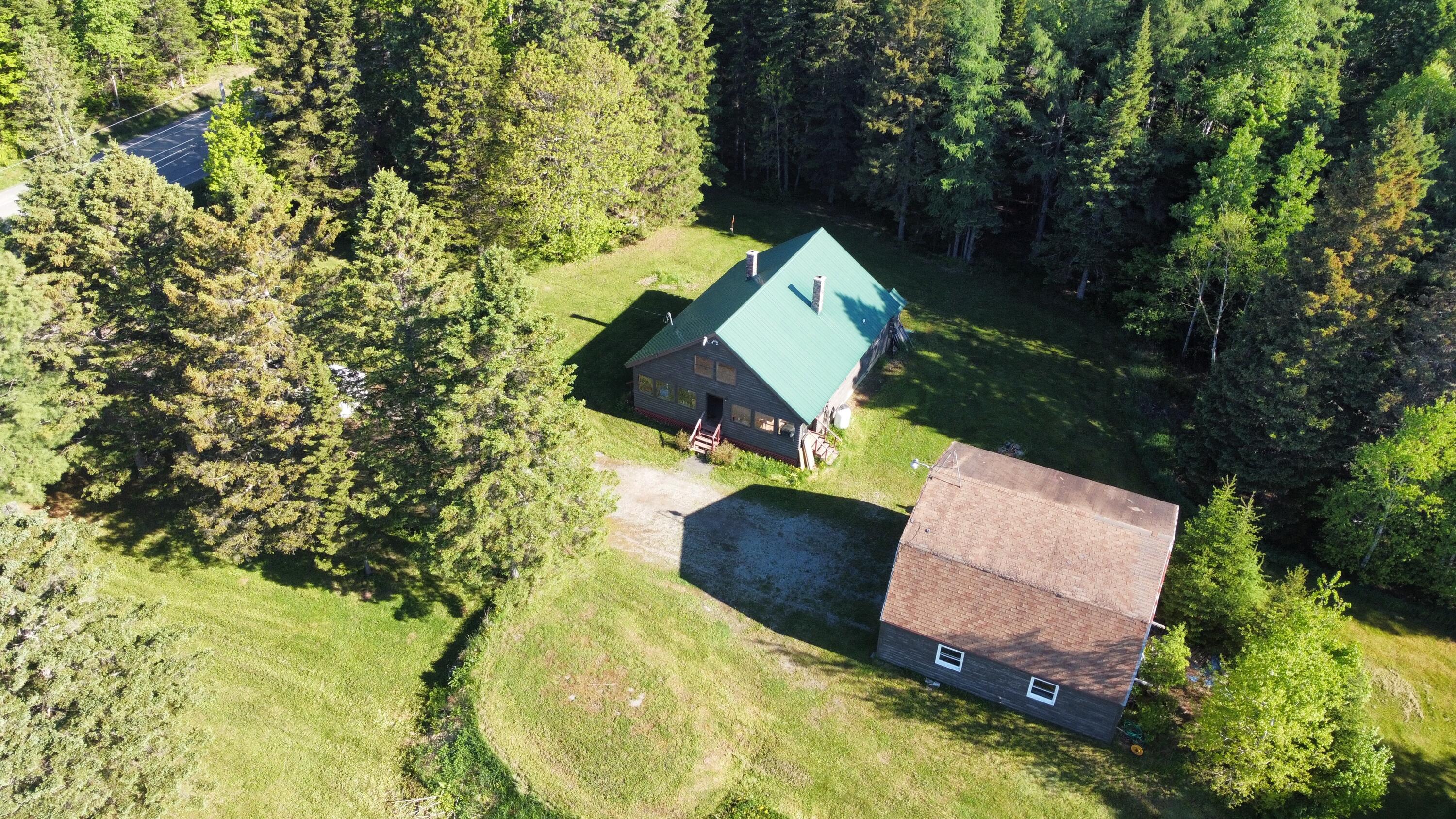 3188 Portage Road Portage, ME 04768 - Photo 29 of 29 dji_fly_20240525_080448_313_171663912354