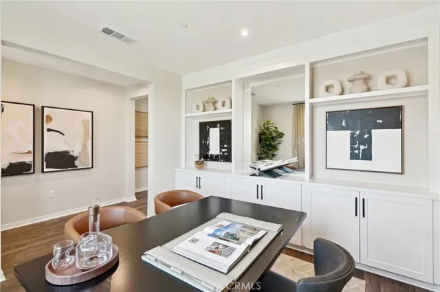 a living room with furniture and window