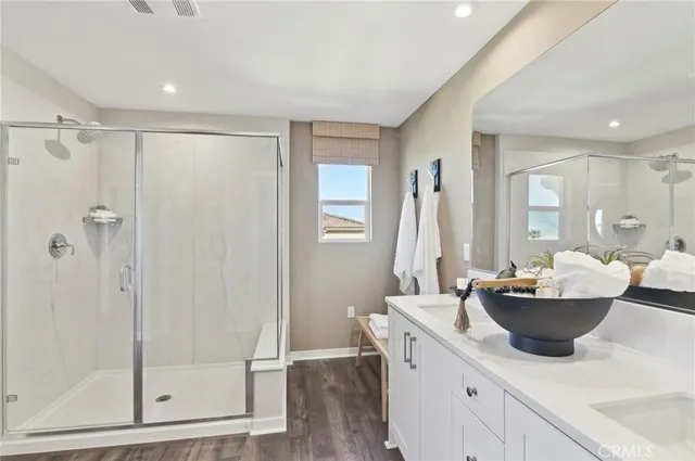 a dining room with a window and chandelier