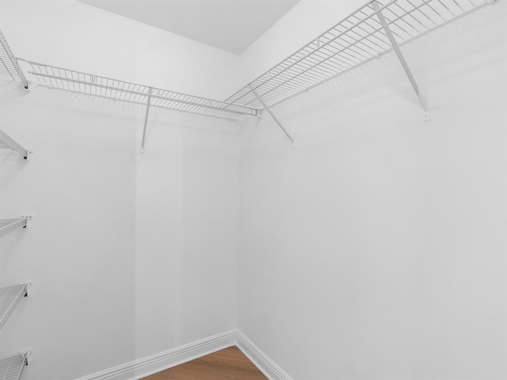 1745 East Hallandale Beach Boulevard, Unit 2007W Hallandale Beach, FL 33009 - Photo 10 of 16 a view of a room with racks on the wall