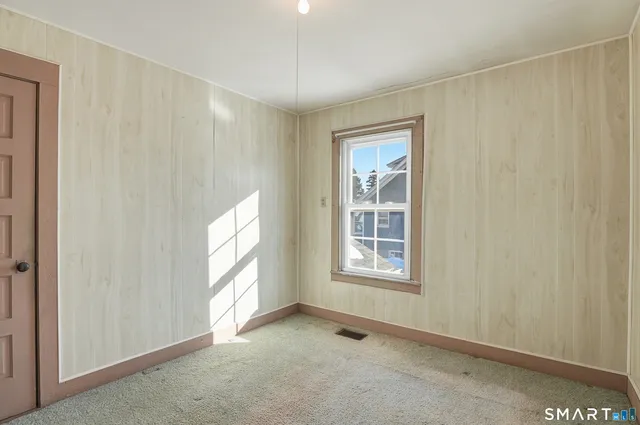 a bathroom with a sink and bathtub with toilet