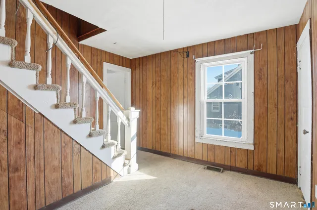 a view of livingroom with stairs
