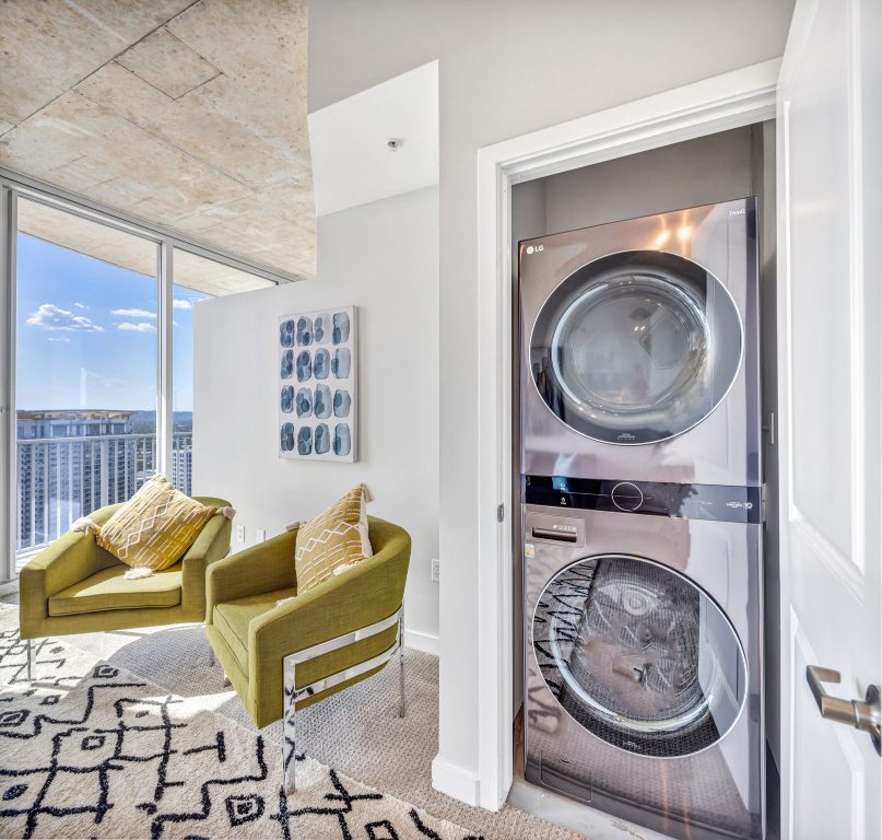 360 Nueces Street, Unit 2906 Austin, TX 78701 - Photo 5 of 9 a utility room with dryer and washer