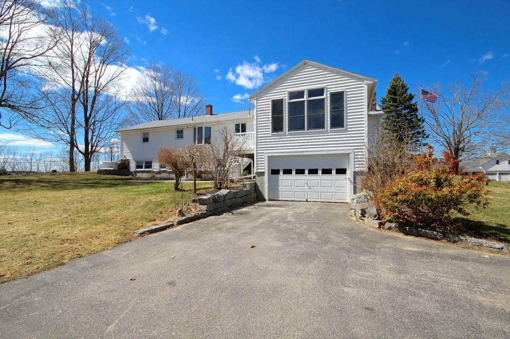 142 Louden Road Saco, ME 04072 - Photo 1 of 35 Rear view showcasing the large...