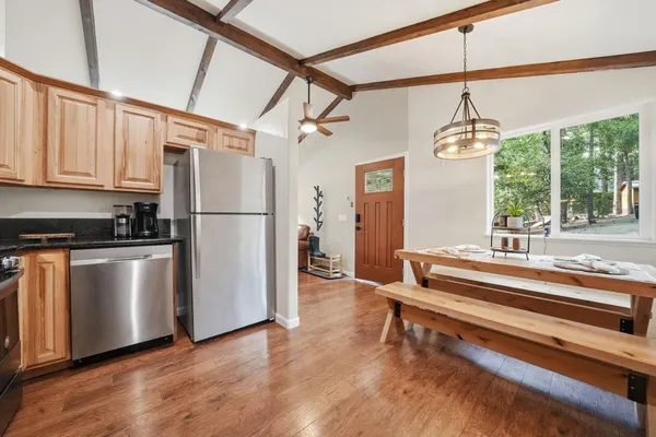 a table with a vase and a vase on it