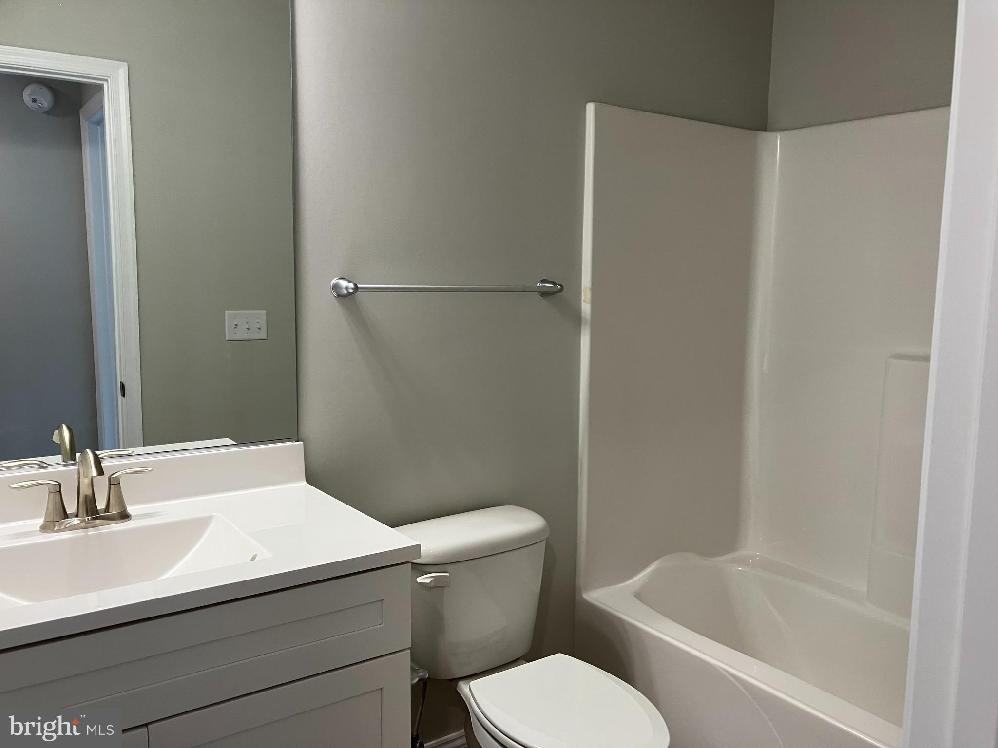 21133 Striper Run Rock Hall, MD 21661 - Photo 7 of 8 a bathroom with a sink toilet and shower
