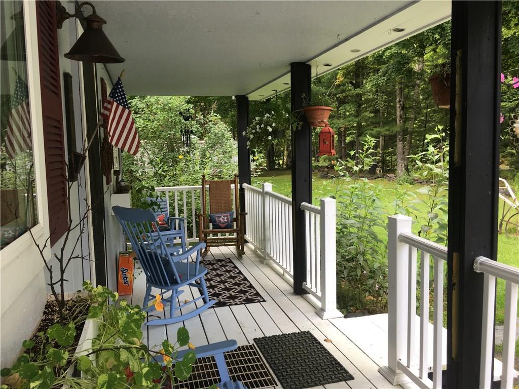 84 Indian Point Loop Monson, ME 04464 - Photo 3 of 19 porch