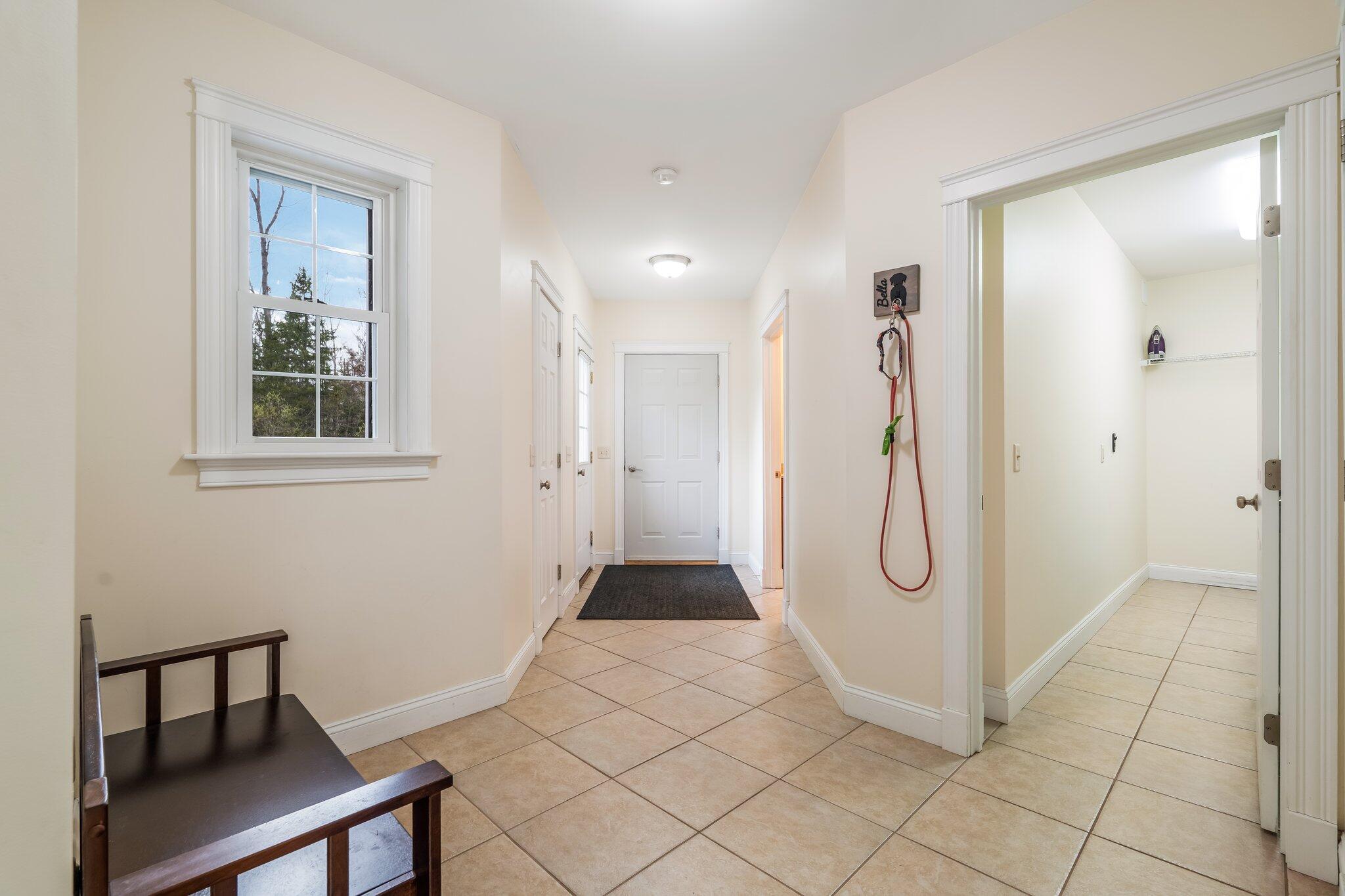 104 Main Trail Hampden, ME 04444 - Photo 18 of 50 Mudroom Entry and Door to Laundry