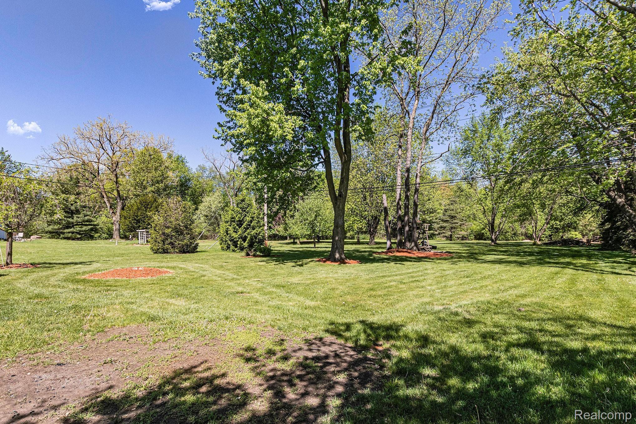 1155 Michelson Road Rochester, MI 48307 - Photo 31 of 36 Partial view of the huge backyard.